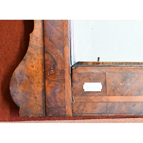 169 - # A Georgian mirror with fret-cut and feather-banded walnut frame - for restoration, 100 cm h x 50 c... 