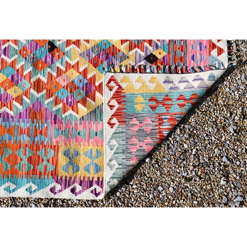 192 - A contemporary Anatolian Turkish kelim, geometric multi-coloured design, 230 cm x 176 cm