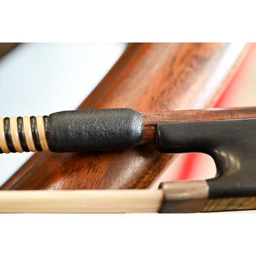 497 - A cased (restored) cello bow with mother of pearl inlaid ebony frog and white metal mounts circa 190... 