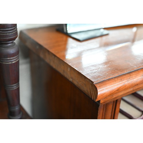 8 - A 19th century mahogany open bookcase with three unequal divisions, each having two adjustable shelv... 