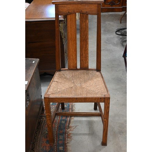 119 - A set of six Liberty Arts & Crafts oak dining chairs with rush seats, circa 1900 (6)Illustrated ... 