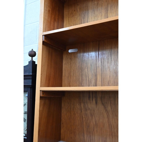 100 - A modern open bookcase with four fixed shelves, 138 cm x 30 cm x 125 cm h to/w a similar smaller exa... 