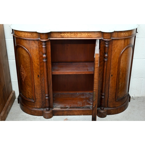 103 - A Victorian walnut inlaid credenza with marble top over a mirrored central door between panelled cup... 