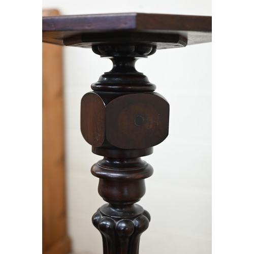 21 - A mahogany jardiniere stand with turned and reeded baluster column and square base, 103 cm high