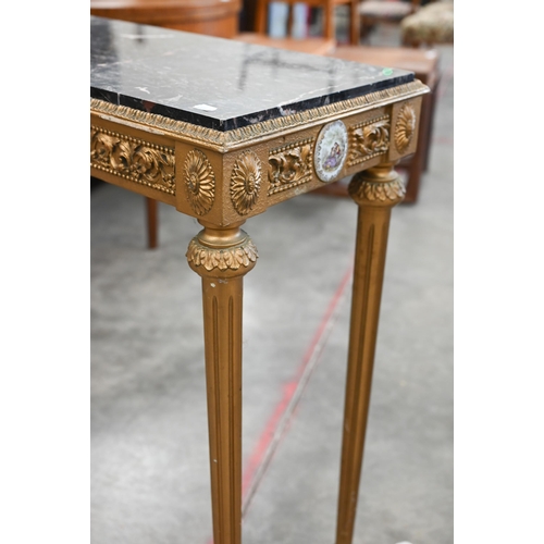 27 - A French Louis XVI style marble topped console table, gilt wood base with ceramic plaques printed wi... 