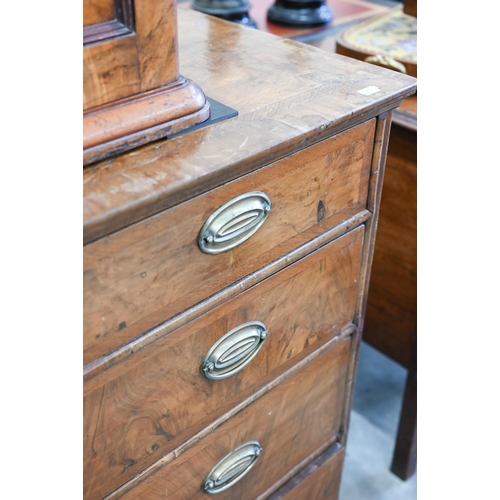 36 - A Georgian walnut feather banded chest of two short over three long graduating drawers raised on sha... 