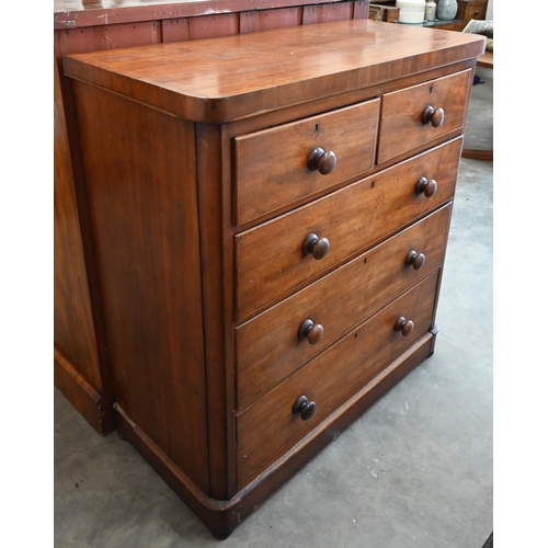 37 - A Victorian mahogany chest of two short over three long drawers with turned handles and bun feet, 10... 