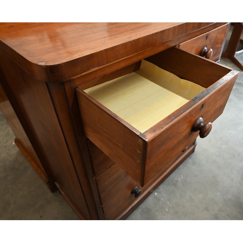 37 - A Victorian mahogany chest of two short over three long drawers with turned handles and bun feet, 10... 