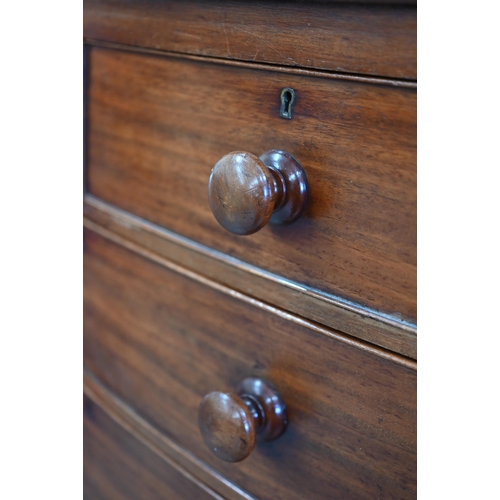 43 - A 19th century mahogany bowfront chest of two short over three long drawers raised on turned support... 