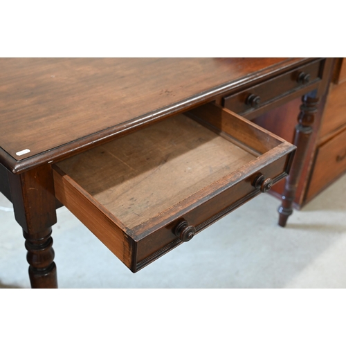 44 - A 19th century mahogany two-drawer hall table on turned supports, 106 cm x 54 cm x 72 cm h