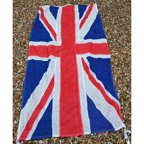 459 - A vintage stitched linen Union flag, 177 x 80 cm to/w a needlework armorial banner and a glazed disp... 