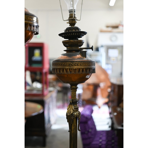 468 - A rare pair of Victorian gilt-brass telescopic floor standing oil-lamps, with copper reservoirs, lat... 