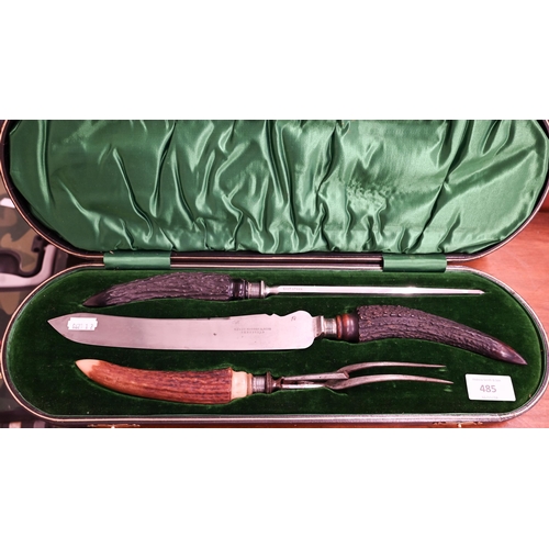 485 - An Edwardian cased three-piece carving set with silver-mounted antler handles, Sheffield 1905