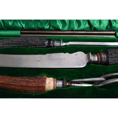 485 - An Edwardian cased three-piece carving set with silver-mounted antler handles, Sheffield 1905