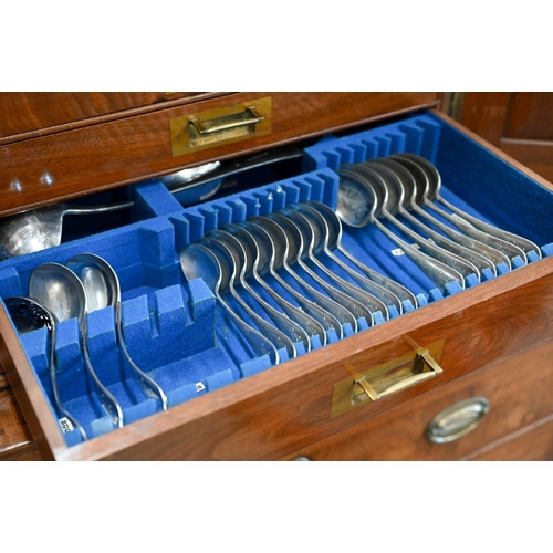 488 - A Victorian walnut canteen with flush brass side handles, twin panel doors enclosing four drawers, c... 