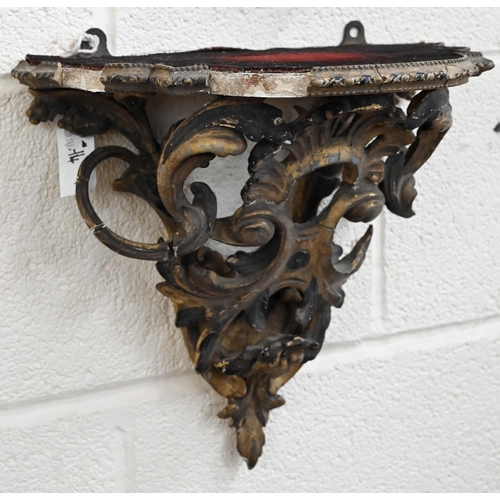 490 - A Florentine style gilt gesso scrolling wall-bracket, 32 cm high