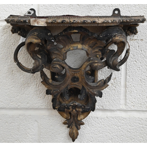 490 - A Florentine style gilt gesso scrolling wall-bracket, 32 cm high