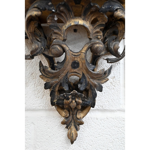 490 - A Florentine style gilt gesso scrolling wall-bracket, 32 cm high