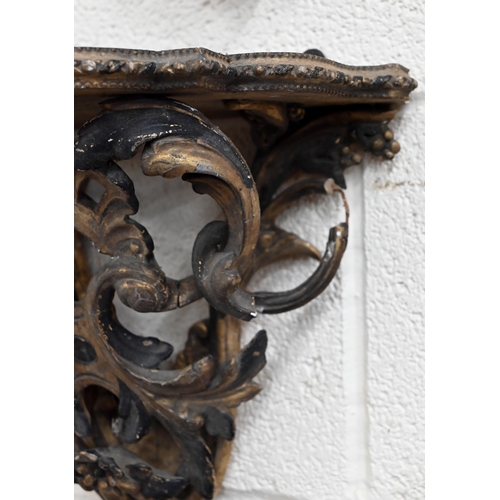 490 - A Florentine style gilt gesso scrolling wall-bracket, 32 cm high