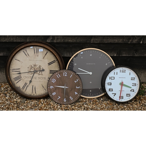 493 - Four various wall clocks - the largest 63 cm diam