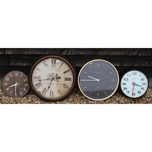 493 - Four various wall clocks - the largest 63 cm diam