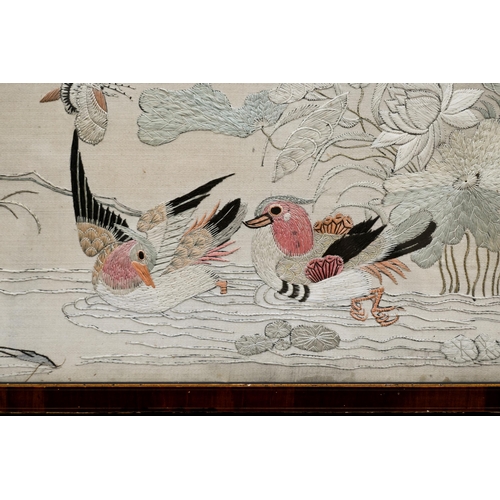 499 - A vintage Chinese silk longstitch panel, worked with exotic birds, 67 x 71 cm, framed and glazed