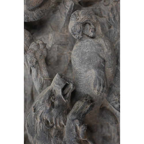 500 - A pair of antique bas-relief carved panels, depicting 'Nature red in Tooth and Claw', with various a... 