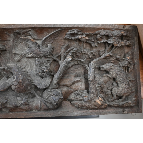 500 - A pair of antique bas-relief carved panels, depicting 'Nature red in Tooth and Claw', with various a... 