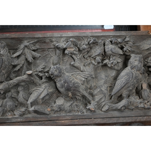 500 - A pair of antique bas-relief carved panels, depicting 'Nature red in Tooth and Claw', with various a... 