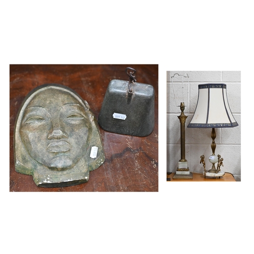 504 - Two brass and onyx table lamps to/w an Art Deco style plaster wall mask and a cow bell (4)