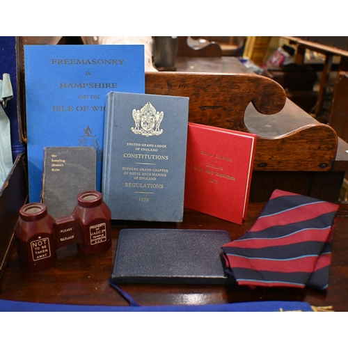 505 - Two Masonic aprons and sash with regalia, to/w various books etc in leather 'Pakawa' case