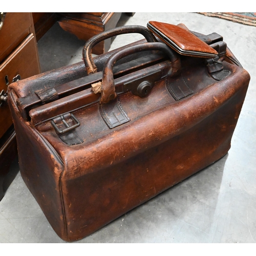 508 - Two antique leather Gladstone bags and a small suitcase (3)