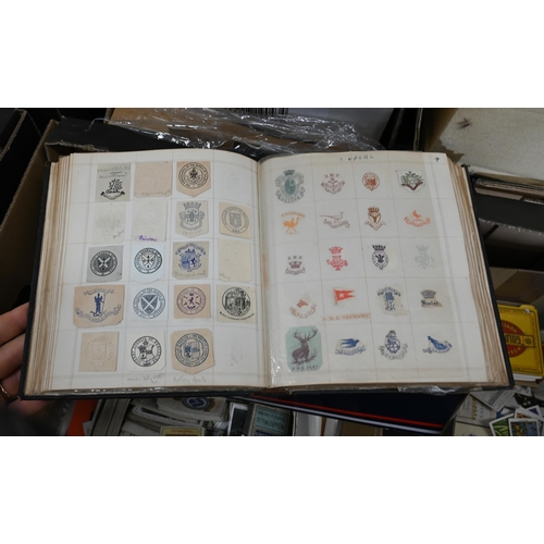 516 - A Victorian album of crests to/w various cigarette and trade cards and other printed ephemera etc (b... 