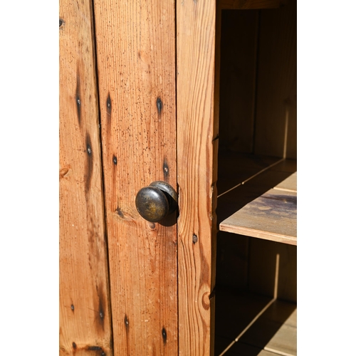 60 - A rustic stained pine two door pantry cupboard with shelved interior, 98 cm w x 40 cm d x 125 cm h