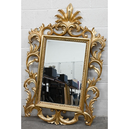 61 - A Florentine style wall mirror with scrolling acanthus giltwood frame, 92 cm x 145 cm h