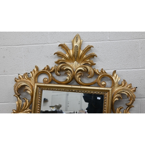 61 - A Florentine style wall mirror with scrolling acanthus giltwood frame, 92 cm x 145 cm h