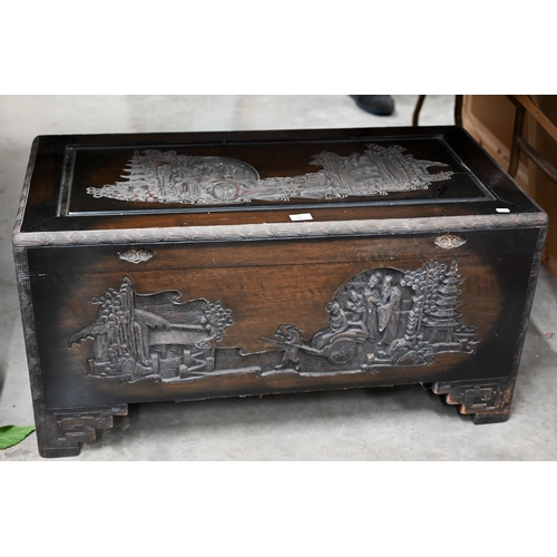 65 - A Chinese carved hardwood and camphor lined trunk, 96 cm w x 48 cm d x 48 cm h