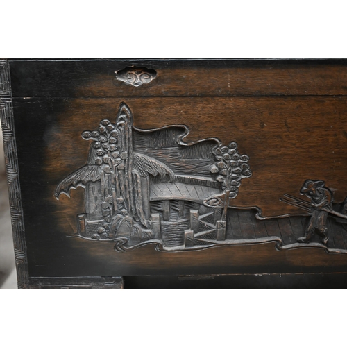 65 - A Chinese carved hardwood and camphor lined trunk, 96 cm w x 48 cm d x 48 cm h