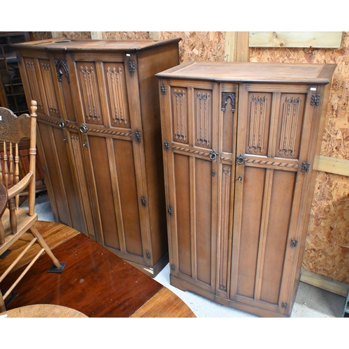 66 - Two 'L. Marcus Ltd' oak wardrobes with linenfold carved panels, 130 x 55 x 185 cm h (largest) (2)