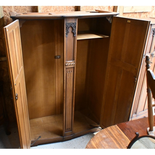 66 - Two 'L. Marcus Ltd' oak wardrobes with linenfold carved panels, 130 x 55 x 185 cm h (largest) (2)