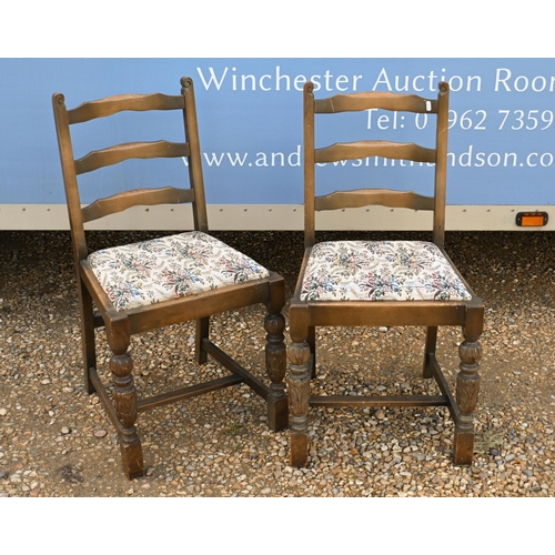 70 - # Six oak ladder back dining chairs with floral pad seats (6)