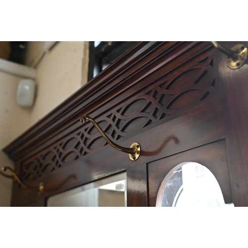 71 - Edwardian mahogany hall stand with bevelled mirror and brass hooks fitted with glove box, stick stan... 