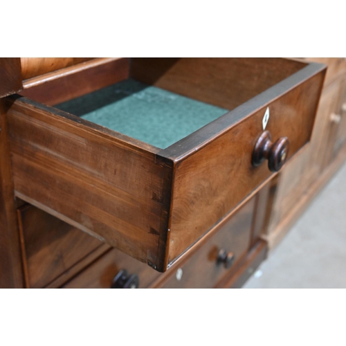 75 - A Victorian mahogany chest with cavetto drawer over two short and three long graduating drawers with... 