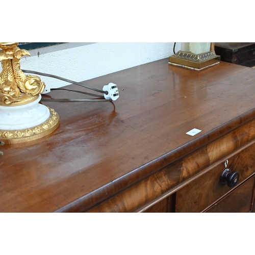 75 - A Victorian mahogany chest with cavetto drawer over two short and three long graduating drawers with... 