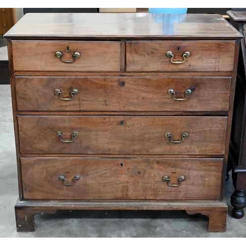 76 - A George III mahogany chest of two short over three long graduating drawers raised on bracket feet,1... 