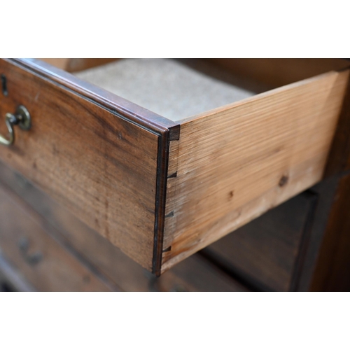 76 - A George III mahogany chest of two short over three long graduating drawers raised on bracket feet,1... 