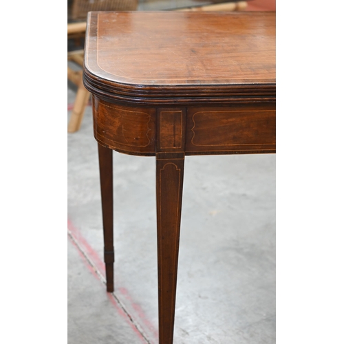 77 - A 19th century mahogany crossbanded folding tea table on tapering square supports, 88 cm w x 45 cm d... 