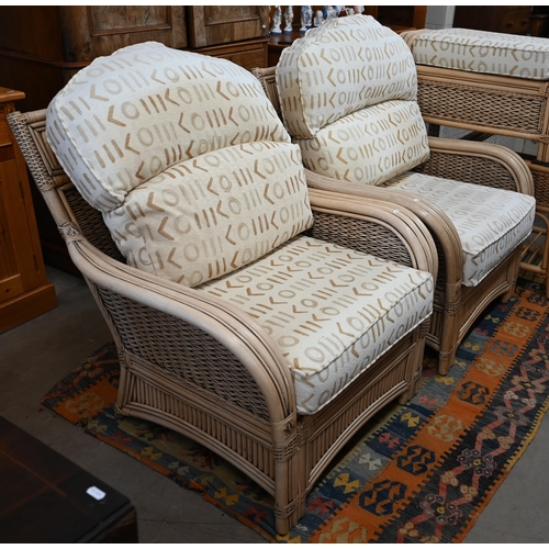 79 - A cane and wicker-rattan conservatory suite comprising a two-seater sofa, 150 cm x 80 cm x 100 cm h,... 