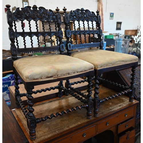 83 - A pair of 19th century carved oak hall chairs with barley twist spindles, supports and stretchers, g... 