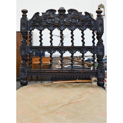 83 - A pair of 19th century carved oak hall chairs with barley twist spindles, supports and stretchers, g... 